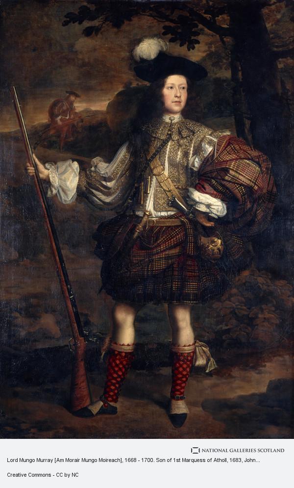 renaissance era man standing in Celtic dress with rifle renaissance era man standing in Celtic dress with rifle