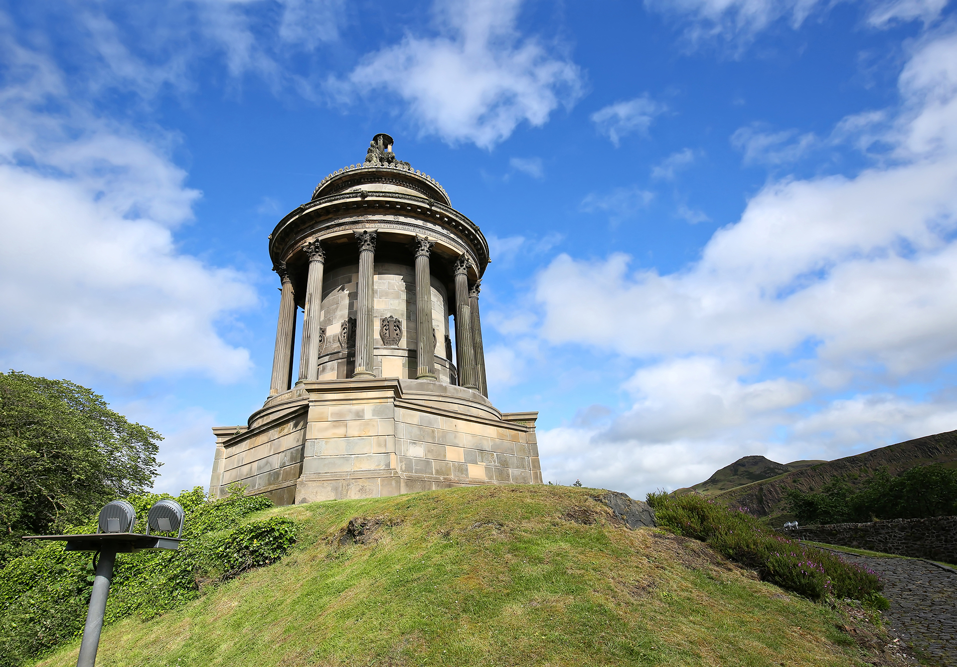 Robert Burns Monument on Regent Road in Edinburgh, Scotland. Robert Burns is considered the National Poet of Scotland. Robert Burns Monument on Regent Road in Edinburgh, Scotland. Robert Burns is considered the National Poet of Scotland.