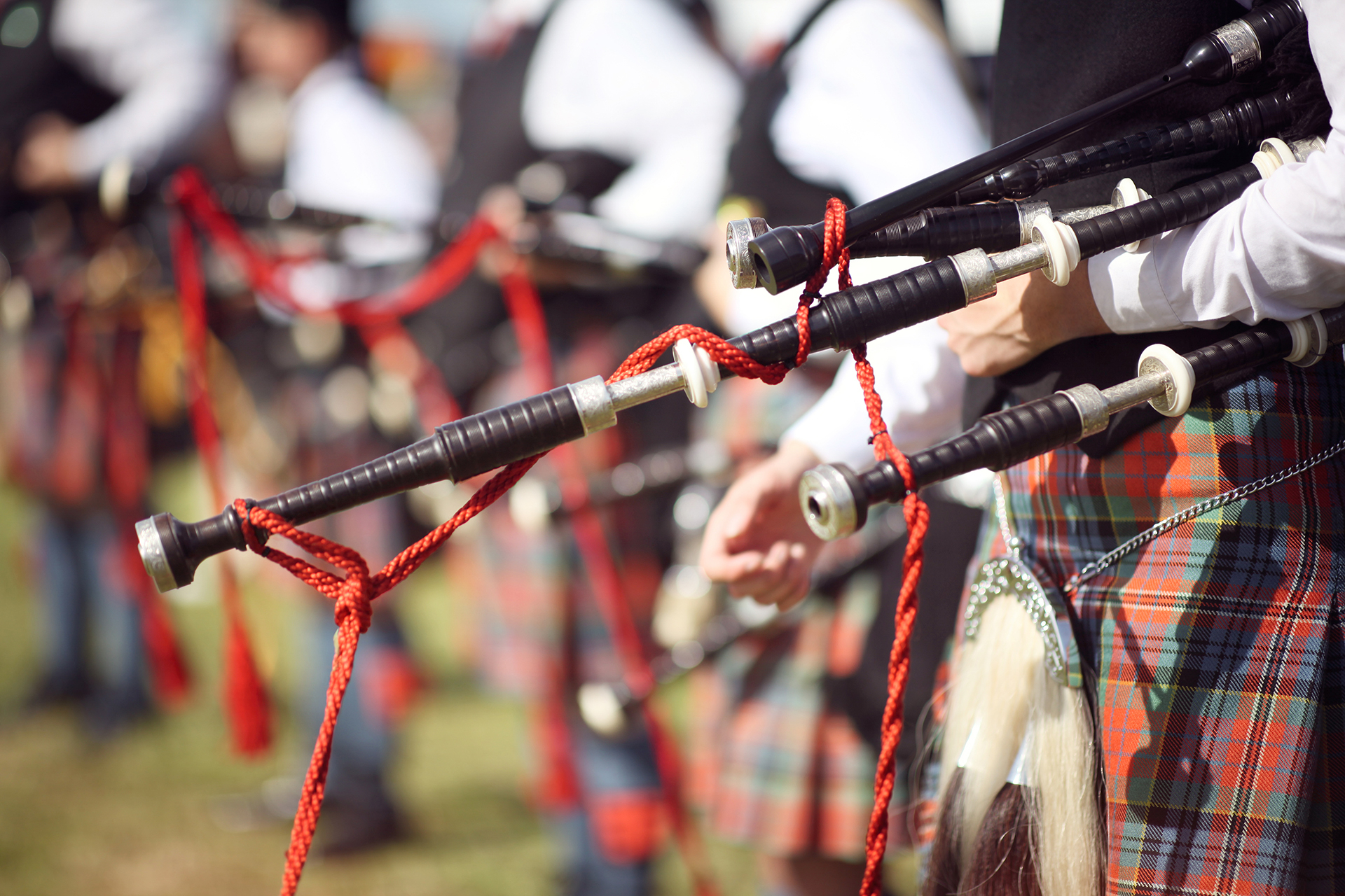 Scottish bagpipe marching band close up on bagpipes Scottish bagpipe marching band close up on bagpipes