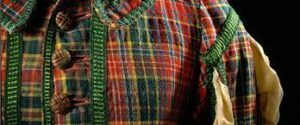 A Royal Scottish tartan coat on a mannequin.