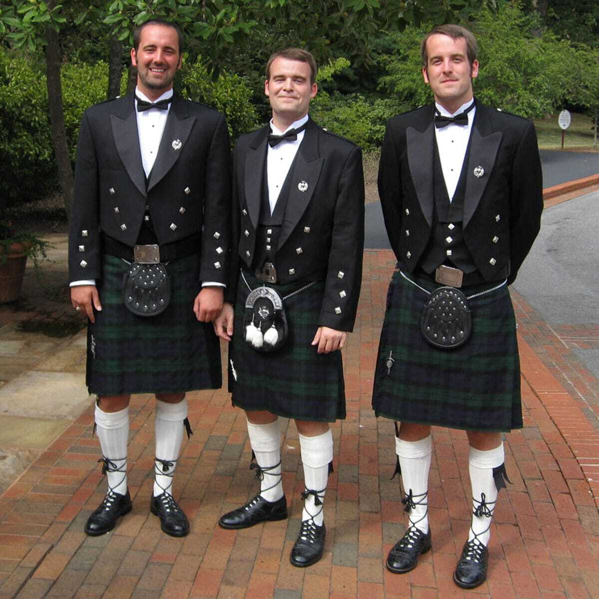 men wearing kilts