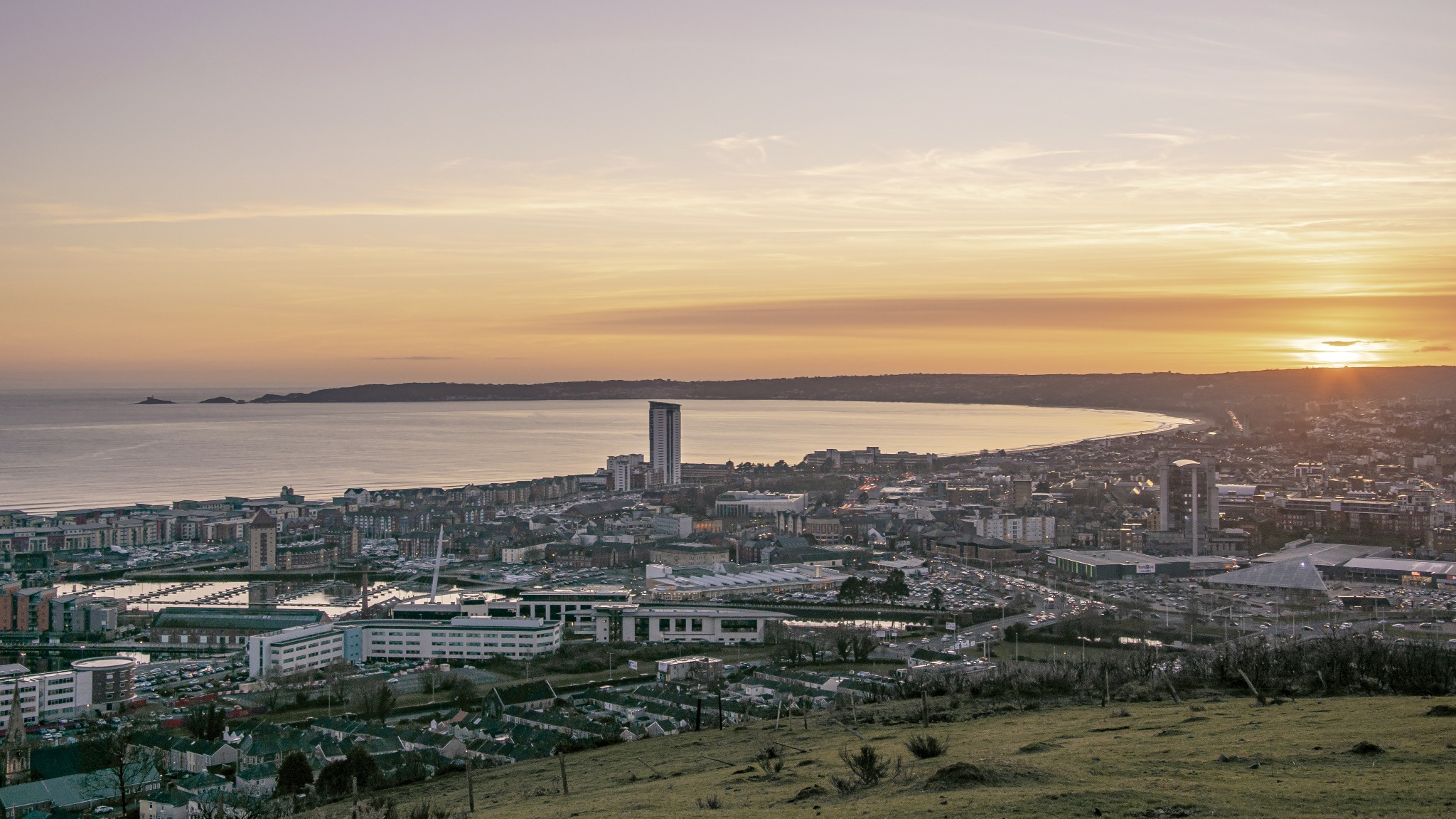 An aerial view of Swansea An aerial view of Swansea, one of the six cities in Wales.