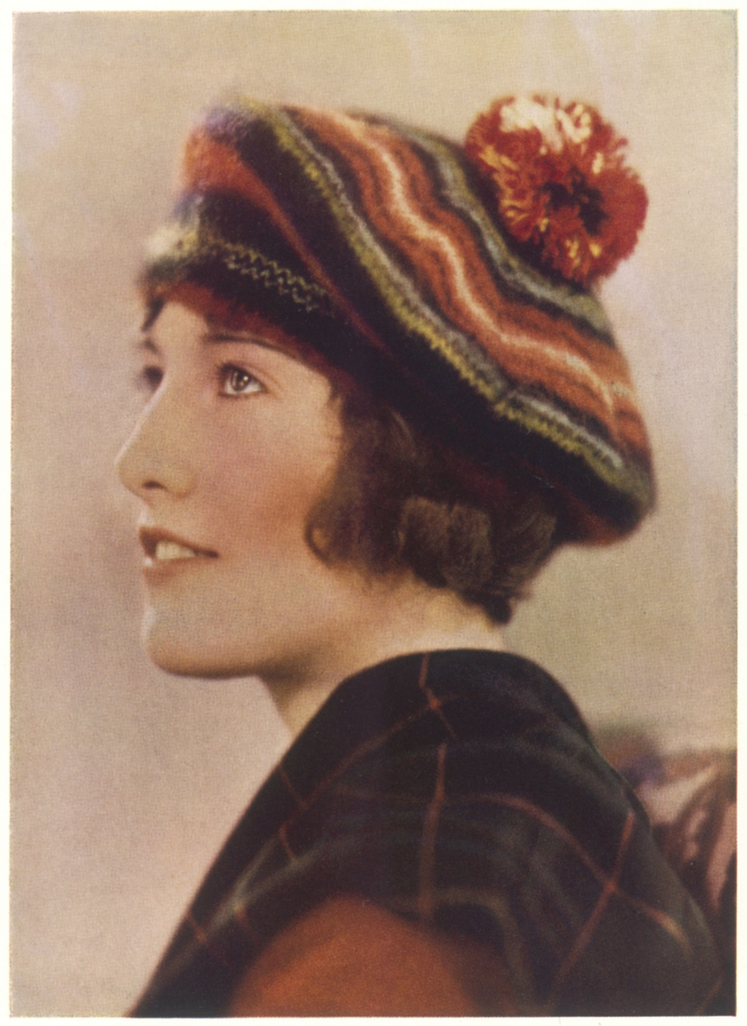 A vintage illustration of a woman wearing a striped tam A vintage illustration of a woman wearing a striped tam