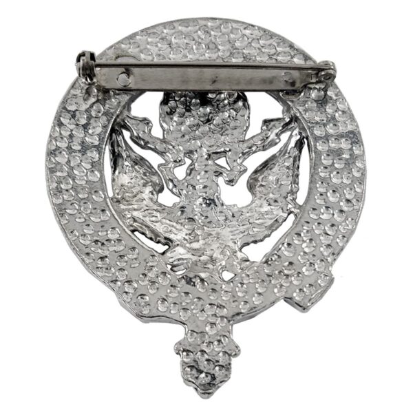 A U.S. Air Force Pewter Cap Badge/Brooch with an eagle and diamonds.