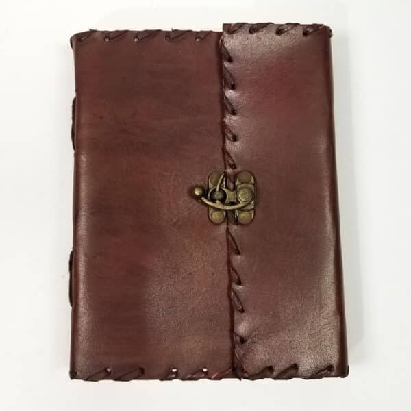 A Plain Leather-Bound Journal with a brass clasp.