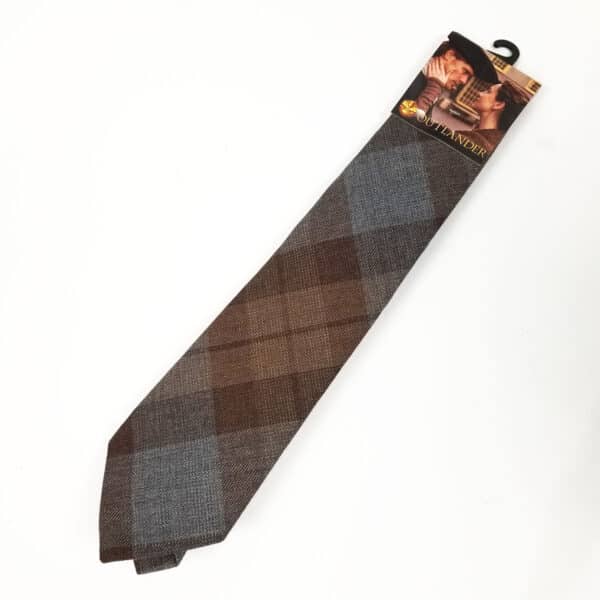 An OUTLANDER Necktie Authentic Premium Wool Tartan featuring dark brown and gray checkered patterns, with packaging displaying the Hogwarts house crest.
