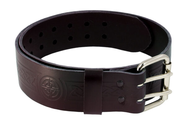 The Celtic Knot Utility Belt and Buckle, a coiled dark brown leather belt featuring embossed designs and a double-pronged metal buckle, exemplifies superior craftsmanship.