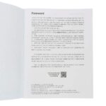 An open Learn to Play Bagpipe Book with the words "Learn to Play Bagpipe Book" forward on it.