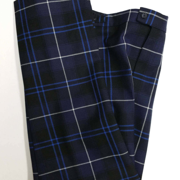 Tartan Trews and trousers folded on a white background from The Celtic Croft.