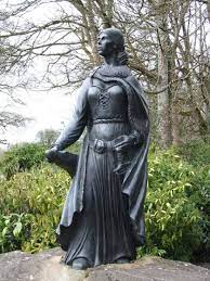 An Irish woman holding a sword.