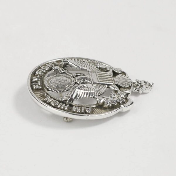 A U.S. Air Force *Sterling Silver Cap Badge/Brooch* featuring an eagle design.