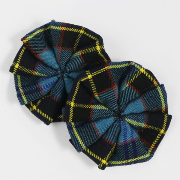 Two MacLeod of Lewis Modern Wool-Blend Tartan rosettes on a white surface.