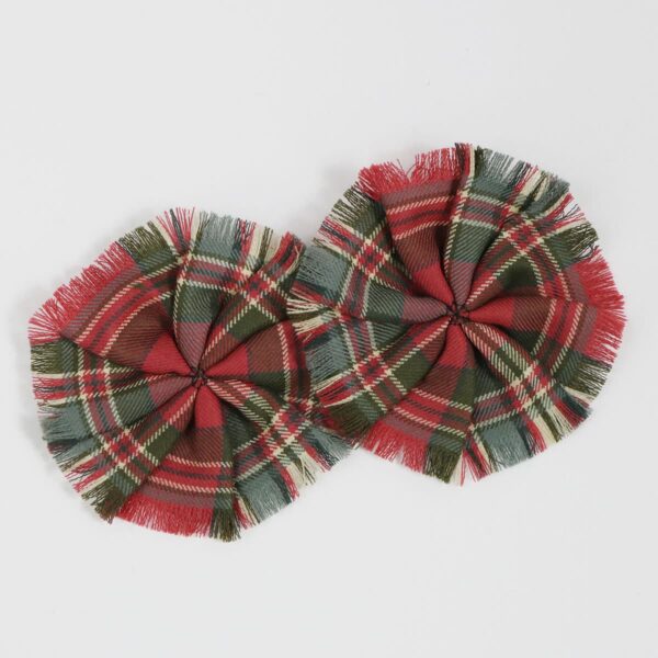 MacFarlane Weathered Light Weight 11oz Wool Tartan Rosettes are shown on a white surface.