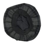 A black and grey Night Watch Tartan Tam on a white background.