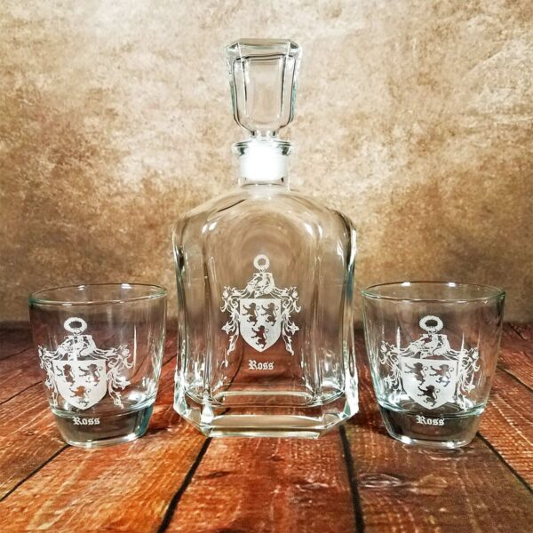 The Irish Coat of Arms 23.75oz Decanter and Whisky Glass Set is on a wooden table.