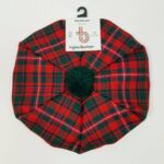 A MacKinnon Modern Tartan Tam - Spring Weight 8oz Wool with a pom pom.