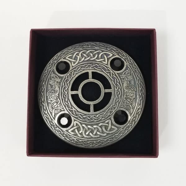 A Celtic Knot Pewter Plaid Brooch in a box.