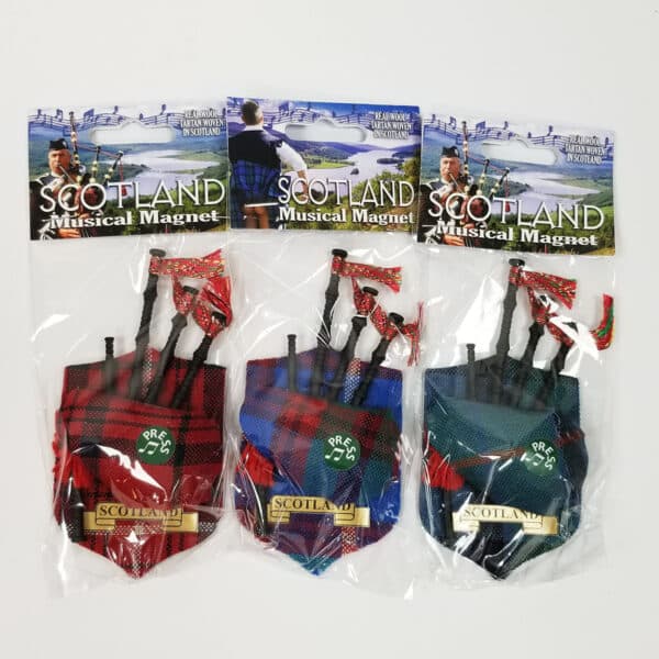 Three Scotland-themed Highland Cathedral bagpipe magnets displayed on a white background.