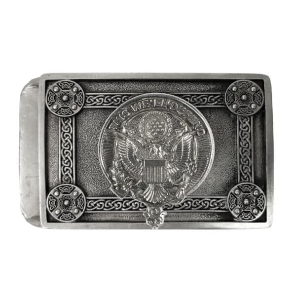 A U.S. Army Pewter Kilt Belt Buckle featuring a silver eagle emblem at the center, surrounded by intricate designs and text reading "This We'll Defend.