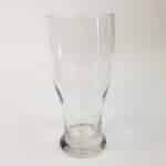 This 19 oz MacKenzie Clan Crest pilsner glass features a clear glass design with an embossed clan crest and the text "Clan MacKenzie," capturing the charm of traditional beer mugs.