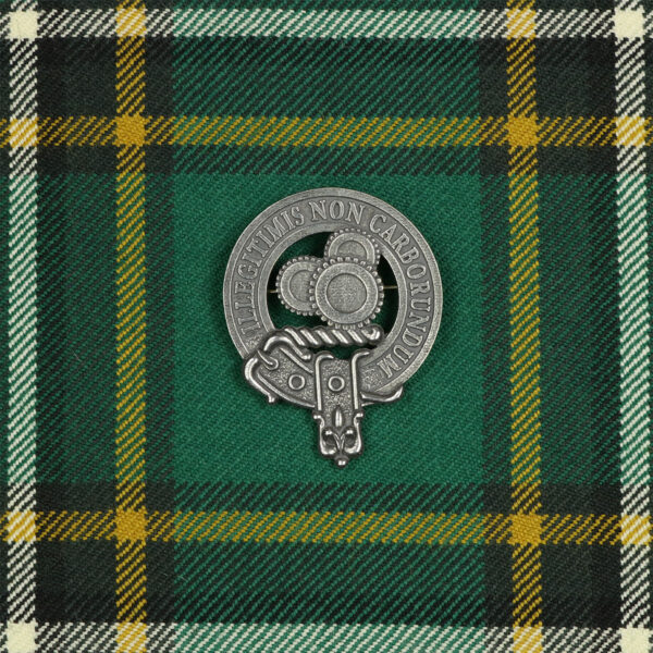 A Machine Gears Steampunk Cap Badge/Brooch featuring a Scottish clan crest on a vibrant green and yellow tartan.