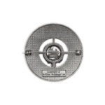 A Clan Crest Thistle Pewter Plaid Brooch with a metal circle decorated with a thistle pattern.