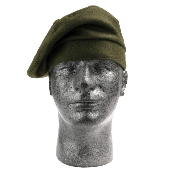A head mannequin wearing a khaki military-style Balmoral/Tam beret.