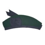 A Felted Wool Glengarry hat with a bow on it.