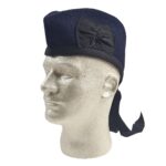 A Felted Wool Glengarry hat with a bow on it.