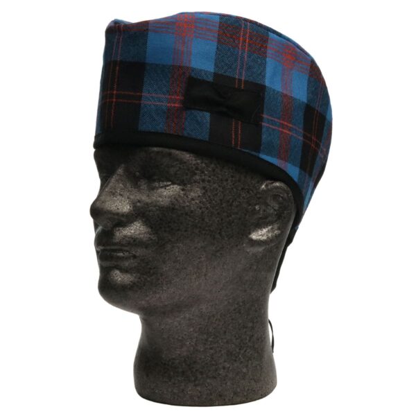 A mannequin wearing a plaid hat.