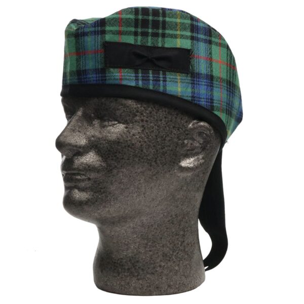 A mannequin wearing a Stewart Hunting Ancient Tartan Glengarry - Spring Weight - M hat.
