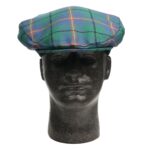 A mannequin wearing a Carmichael Ancient Tartan Driving Cap or Golf Cap - Spring Weight.