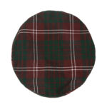 A round tartan cap on a white background.