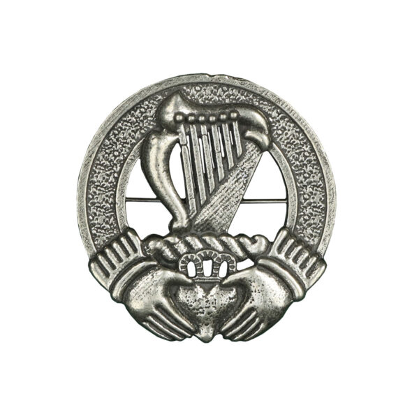 An Irish Harp cap badge/brooch with a hand.