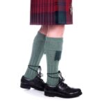 A man wearing Quality Wool Blend Kilt Hose.