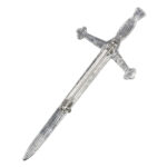 A Celtic Thistle Top Pewter Kilt Pin on a pewter background.
