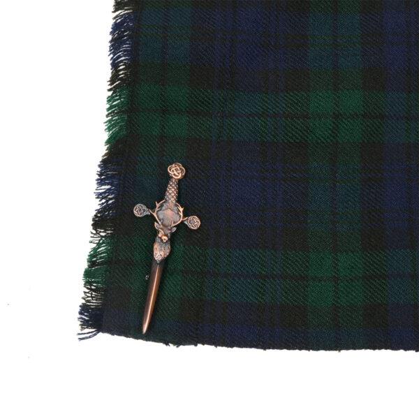 A Scottish tartan lapel pin adorned with a Stag's Head Bronze Kilt Pin.