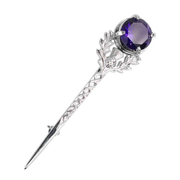 A Large Gem Amethyst Thistle Kilt Pin featuring a vibrant purple stone.