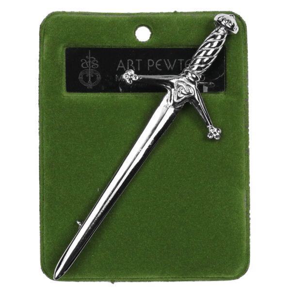 A Claymore Sword Kilt Pin is sitting on top of a green card.