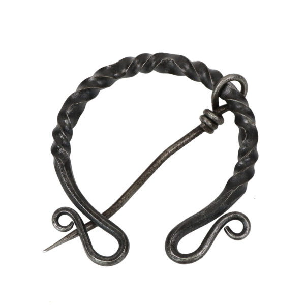 A Wrought Iron Penannular Brooch with a twist.
