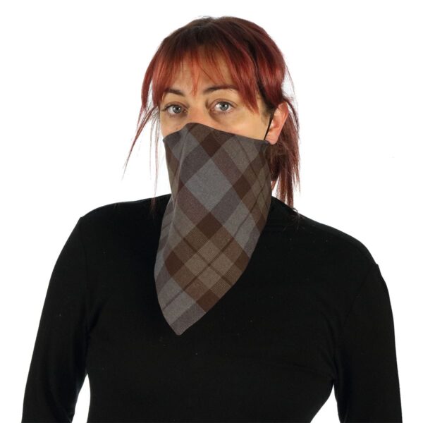 A woman sporting an eye-catching Tartan Bandana Masks - Wool Free.