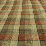 A close up image of a tweed fabric.