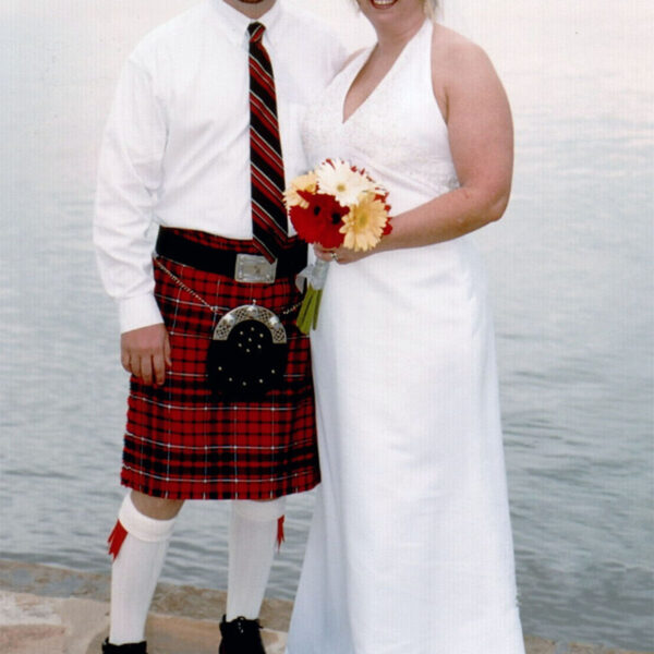 A bride and groom in a 5 Yard Heavy Weight 16oz Premium Wool Formal Kilt.
