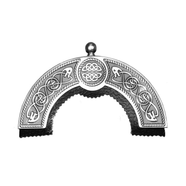 A black and white image of a celtic design on a piece of metal, featuring the Deluxe Faux Lynx Dress Sporran.