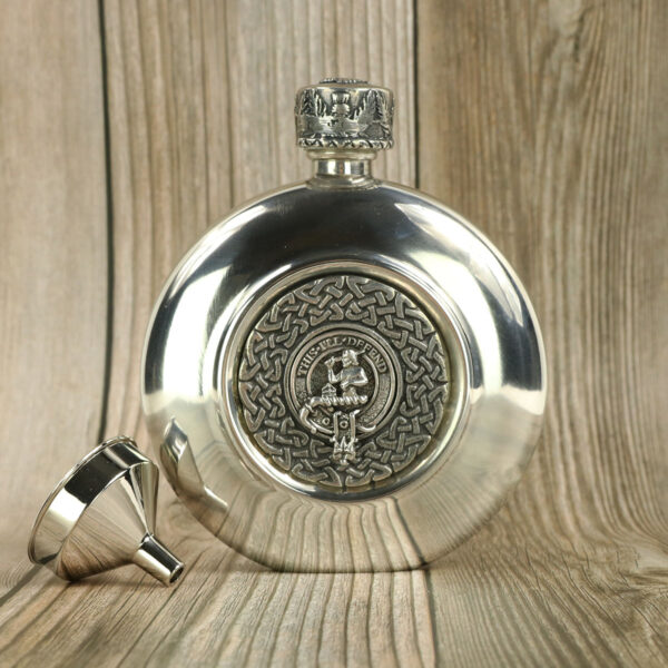 A Clan Crest Antiqued Pewter Flask with a celtic design and clan crest.