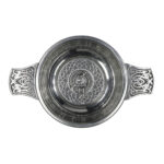 A Davidson Clan Crest Quaich - 3 Inch, with a celtic design on it.