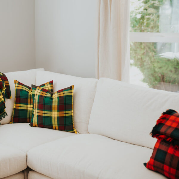 Homespun Tartan blankets/throws on a couch in a living room.