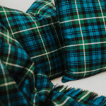 Homespun tartan blanket/throw pillows.