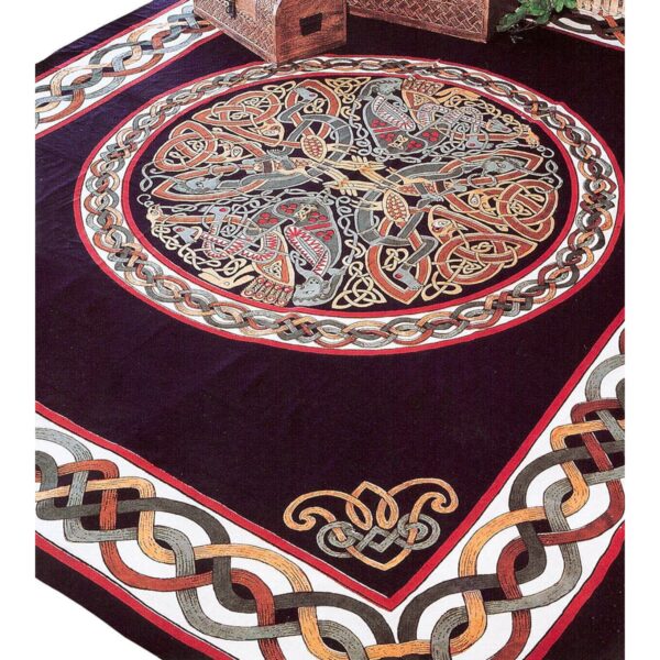 A black rug with a celtic design on it.