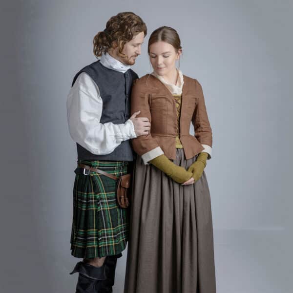 A man and woman donning kilts are posing for a photo, showcasing their Full Length Gathered Skirt - 11oz Premium Wool.